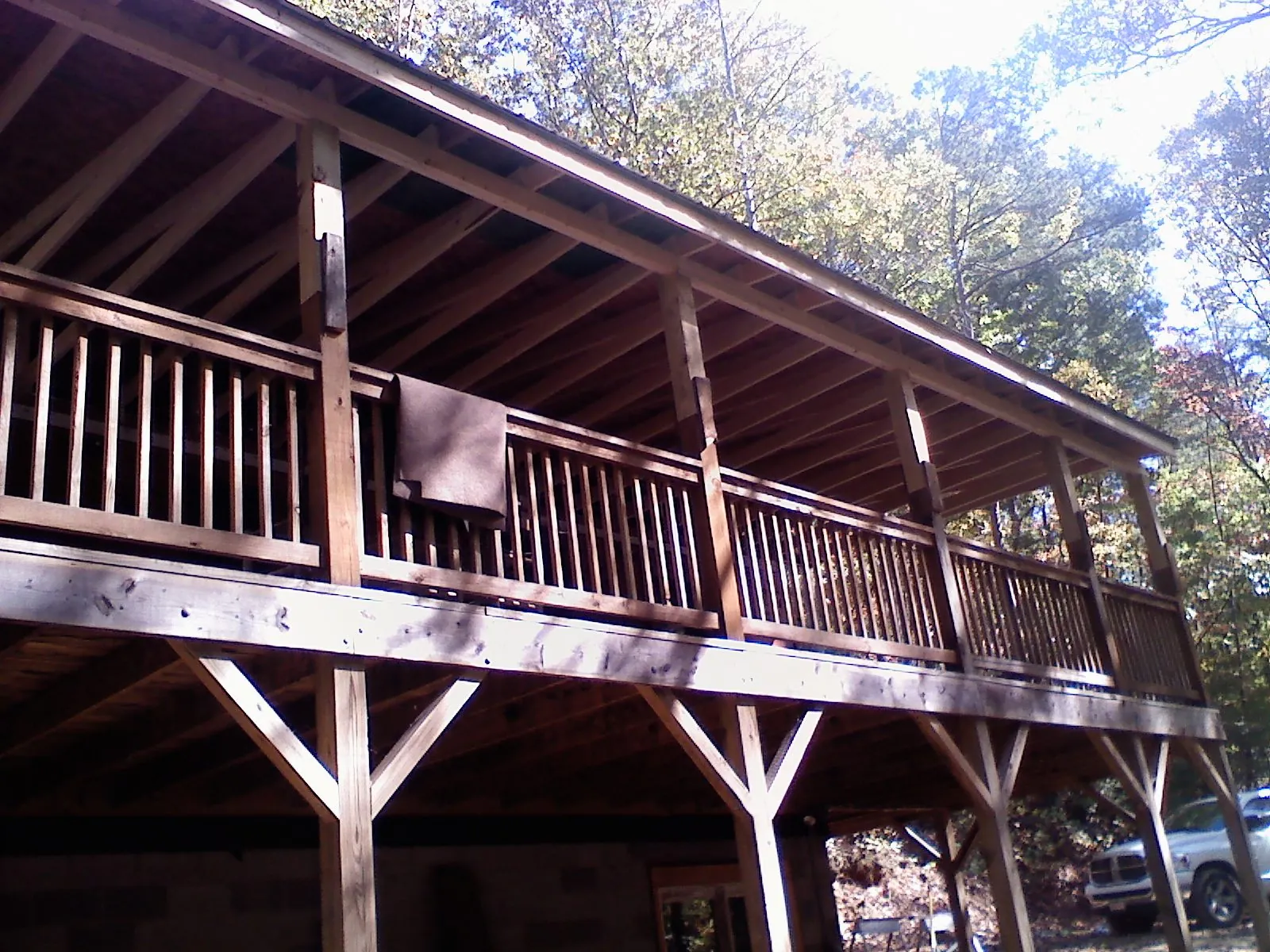 Timber framing under a new elevated porch and deck — Roof Leak Repair in Fruitland Park by Roofing Brothers